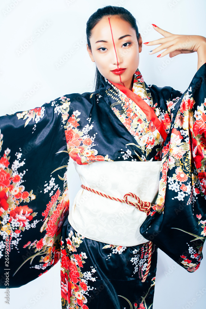 young pretty real geisha in kimono with sakura and decoration on white background isolated young pretty real geisha in kimono with sakura and decoration on white background isolated