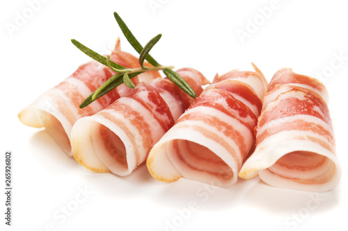 Rolls of pancetta bacon isolated on white