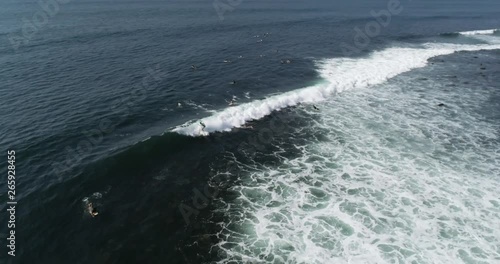 Aerial video of guy surfing. Drone view of surfer in Central America point break. Outdoor sports in lifestyle travel clip.