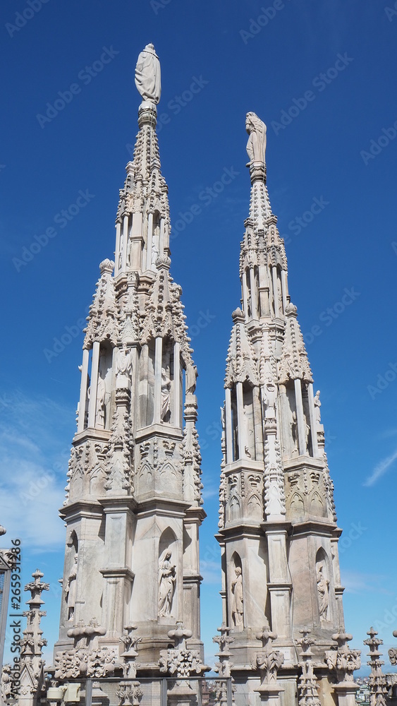 Milano, Italy. The spiers of white marble that adorn the entire cathedral. The Duomo is the most famous landmark in Milan