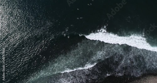 Surfer riding long wave in tropical beach. Aerial video with Airflow Creations travel destination for relaxing SLOW MOTION colorful coast.