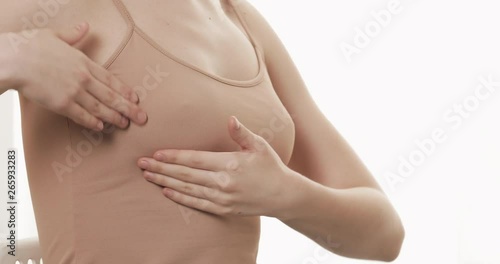 Wallpaper Mural Woman checking her breast for signs of breast cancer. Healthcare and mammology concept. Close up. Torontodigital.ca