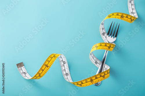 Foto Diet concept on blue background
