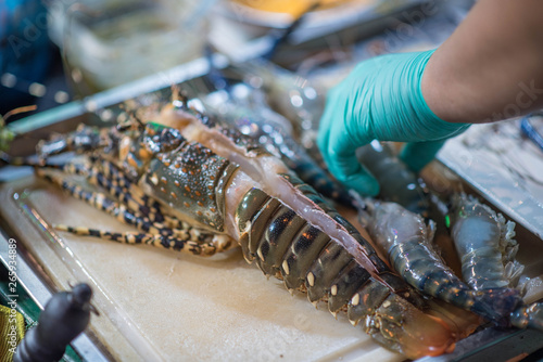Photos Fresh lobster on a cutting board.