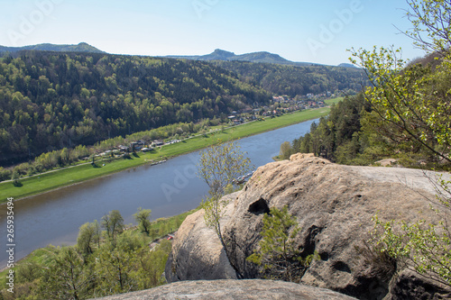 Wallpaper Mural Saxon Switzerland - Germany main attraction. View from Bastei in view of a German town, sandy cliffs and the river Elbe on a sunny spring day Torontodigital.ca