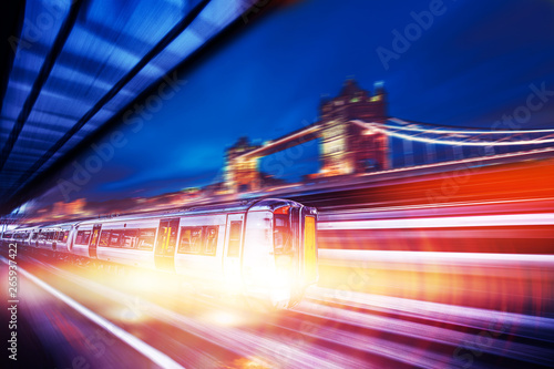 Photography Motion blur of high speed train moving  on London