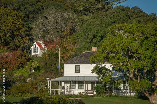 Historic Kemp House and Saint James Church on a Sunny Autumn Morning in Kerikeri, Bay of Islands, New Zealand