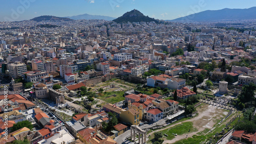 Fototapeta Naklejka Na Ścianę i Meble -  Aerial photo of iconic Ancient Roman Forum a true masterpiece in the heart of ancient Athens - Plaka picturesque district, Attica, Greece