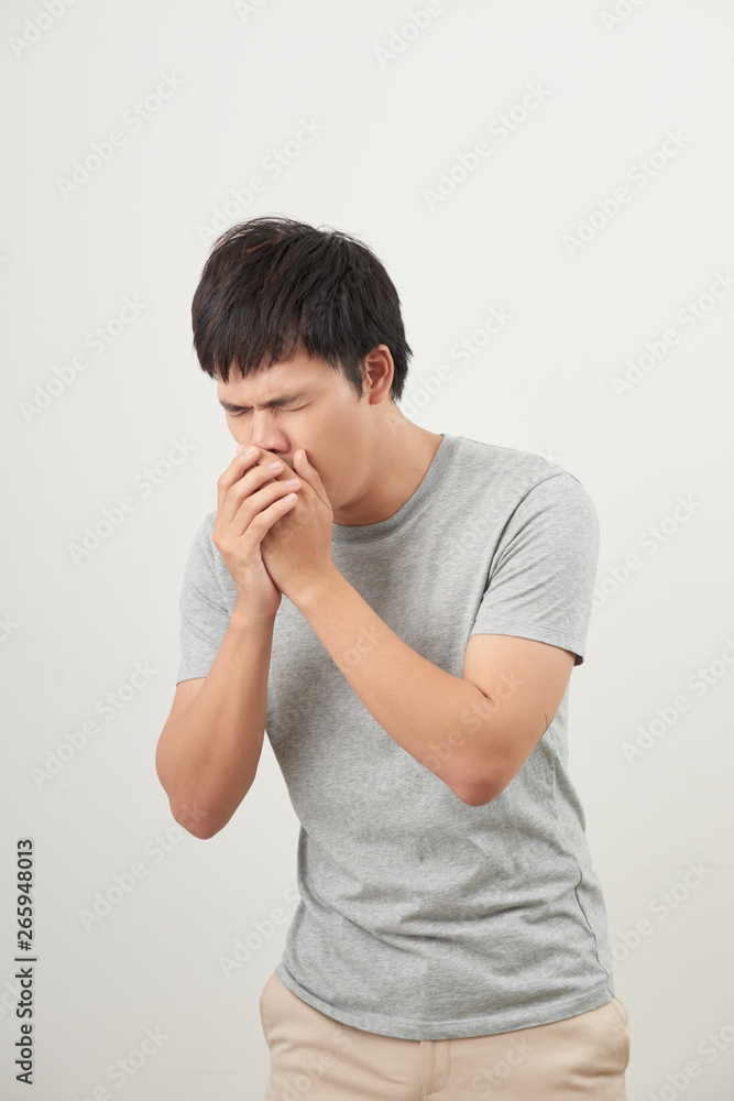 Mature man coughing on white background Mature man coughing on white background