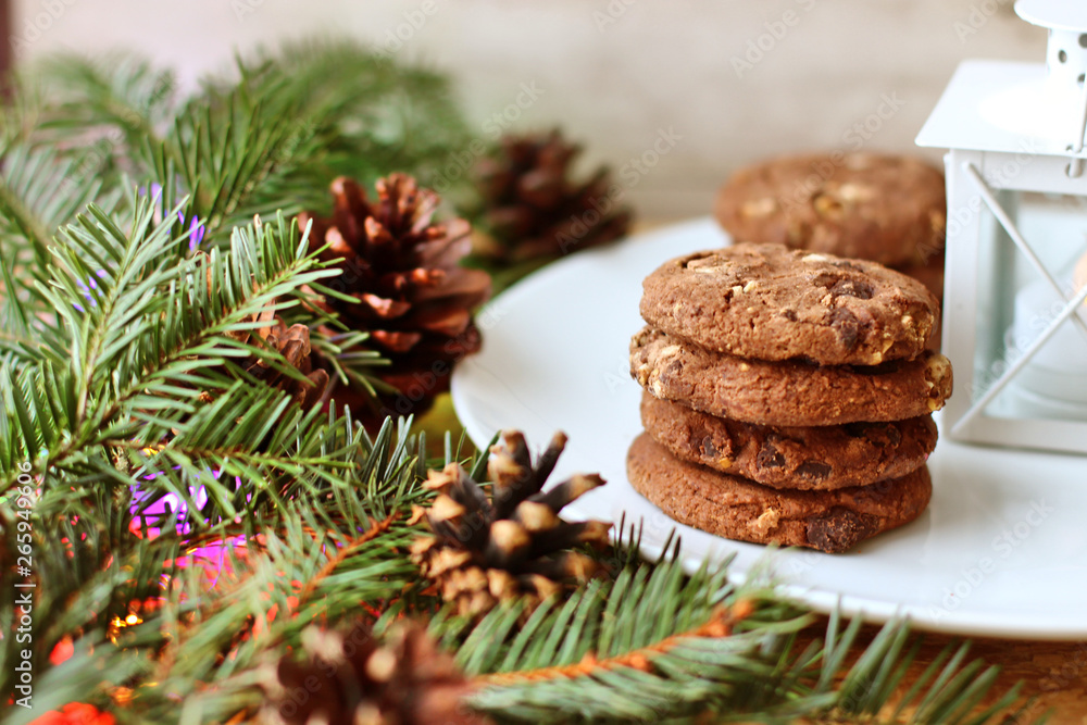 Christmas decorations - oat biscuits for Santa Claus and branches of coniferous trees Christmas decorations - oat biscuits for Santa Claus and branches of coniferous trees