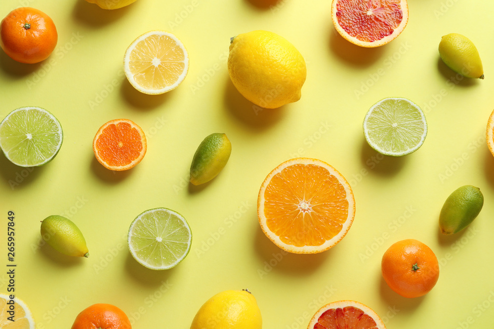 Different citrus fruits on color background, flat lay Different citrus fruits on color background, flat lay