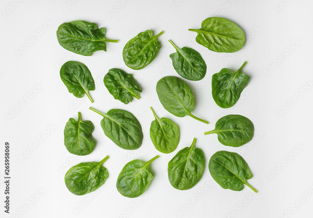 Fresh leaves of spinach isolated on white, top view Fresh leaves of spinach isolated on white, top view