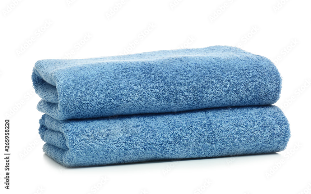 Clean color folded towels on white background Clean color folded towels on white background