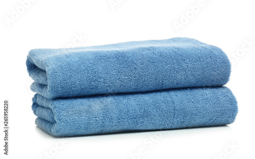 Clean color folded towels on white background