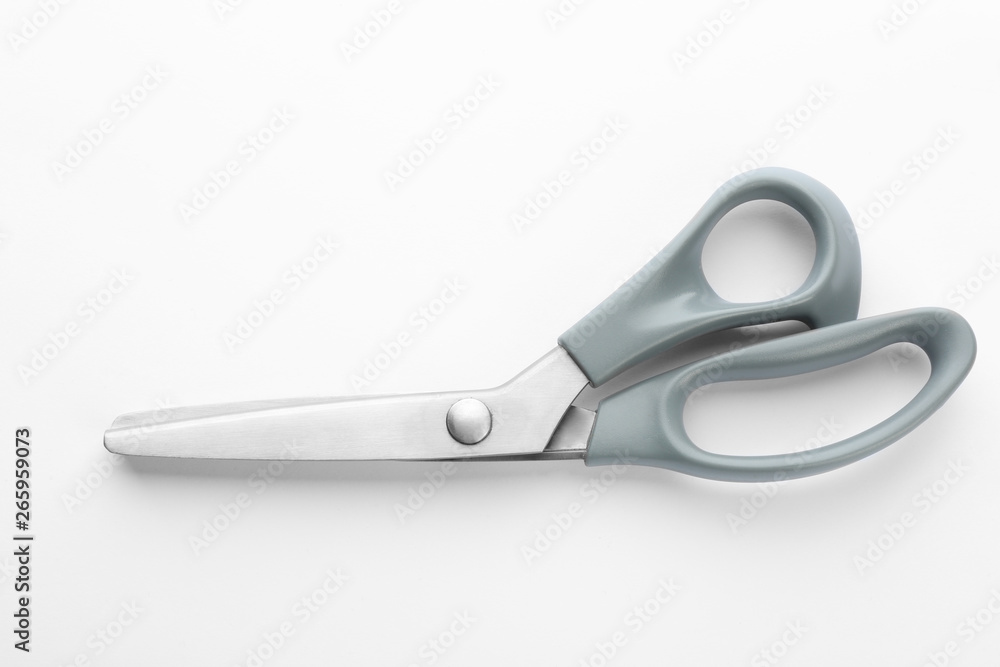 New pair of sewing scissors on white background New pair of sewing scissors on white background