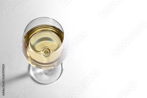 Glass of delicious wine on white background, above view © New Africa