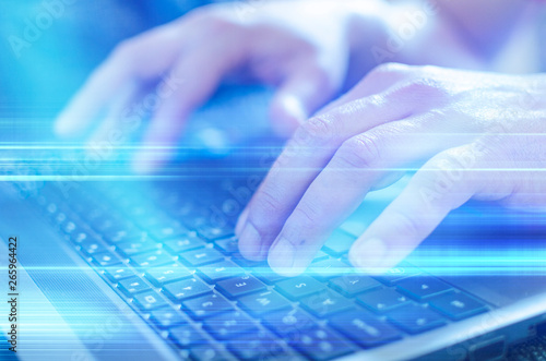 Close up of business man hand working on  laptop computer