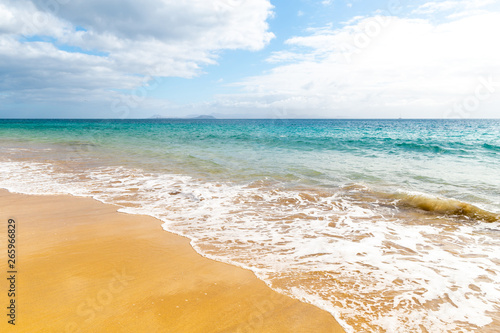 Panorama of beautiful beach and tropical sea of Lanzarote. Canaries © gitusik