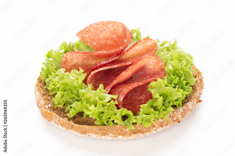 Sandwich with salami sausage on white background. Sandwich with salami sausage on white background.