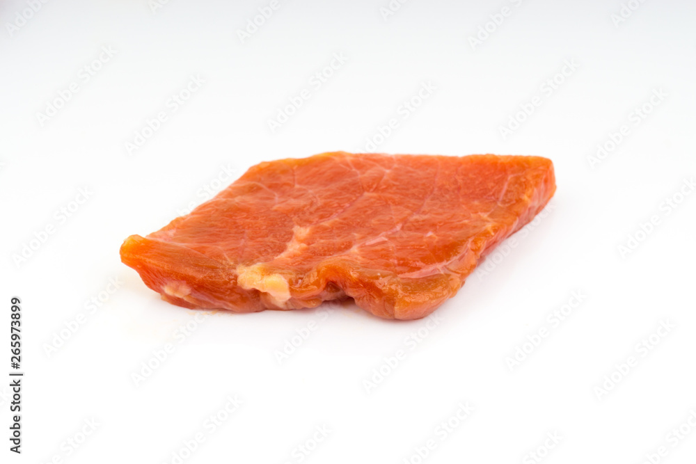 Fototapeta premium Fresh raw beef meat slices isolated over white background. Selective focus
