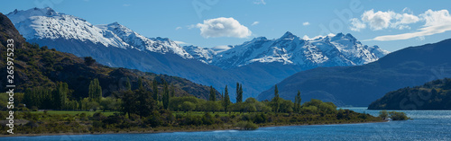Landscape along the Carretera Austral next to the azure blue waters of Lago General Carrera in Patagonia, Chile. Lago Bertrand in the foreground.