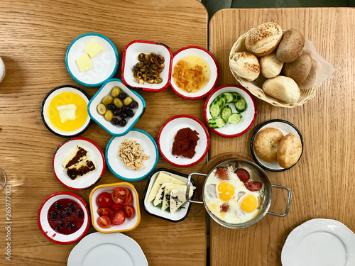 Turkish Breakfast on Wooden Table at Restaurant.