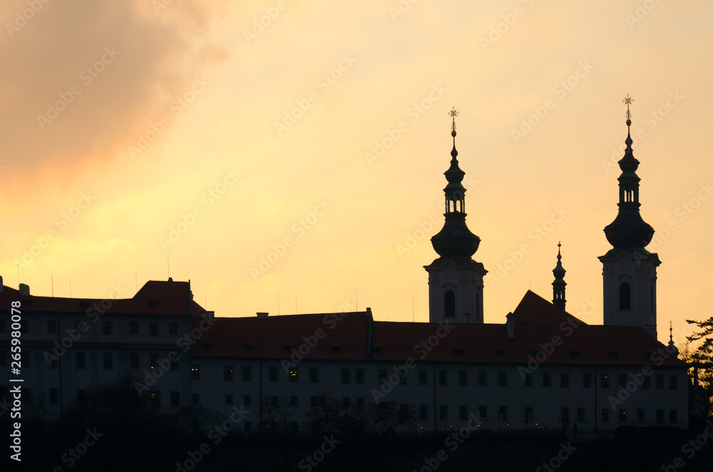 Silhouette of Strahov Monastery in Hradcany with sunset background, Prague, Czech Republic