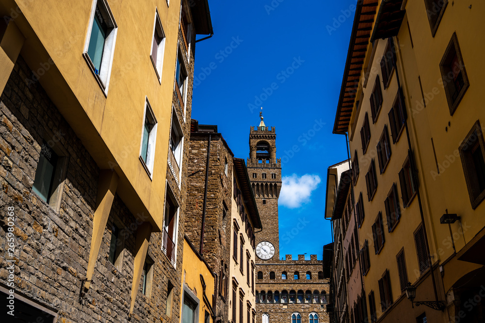 Narrow street in Florence, Tuscany, Italy. Architecture and landmark of Florence cityscape.