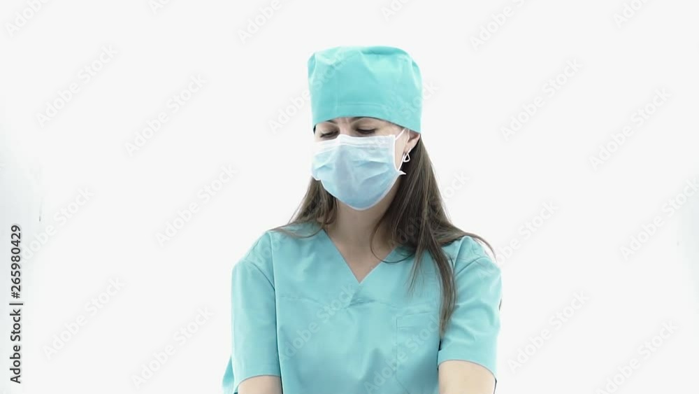 girl doctor puts on medical gloves girl doctor puts on medical gloves