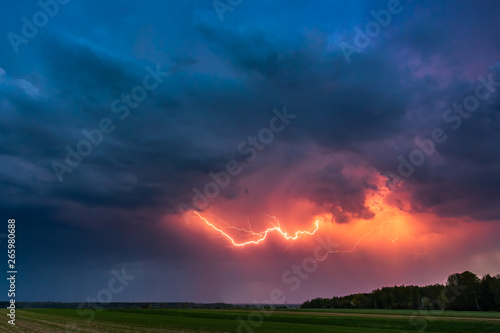 Lightning with dramatic clouds image . Night thunder-storm