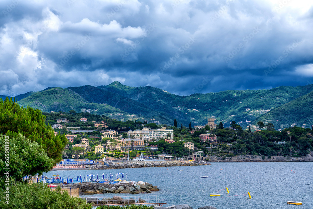 Morning view of Liguria landscape on coastline of mediterranean sea, Italy. View of the picturesque hill with luxury villas.