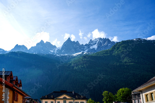 Amazing scenery of the Alps from Chamonix France. Chamonix downtown in summer. Beautiful buildings on a sunny day of summer. Flowers, colorful facades.
