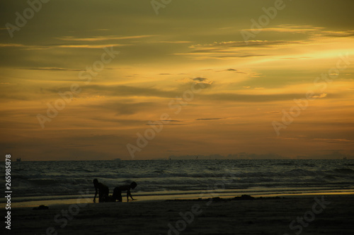  Sunset and sunrise on the beach © Chakkaphong