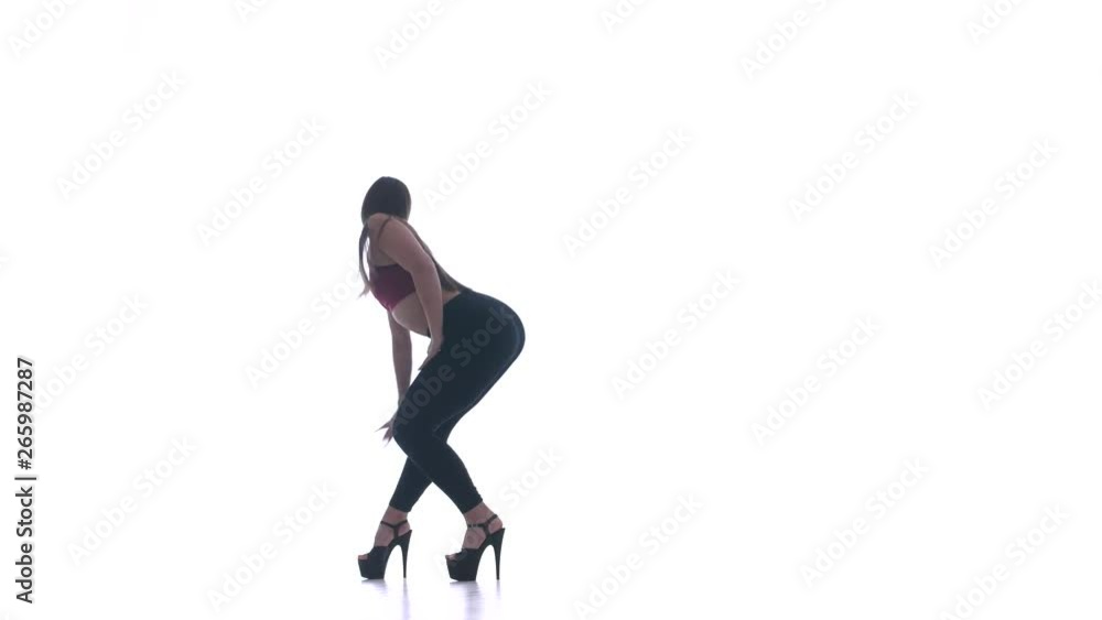 young beautiful girl dancing modern dance on a white background, strip plastic young beautiful girl dancing modern dance on a white background, strip plastic