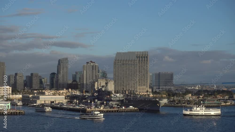 San Diego tour boat passes skyline and harbor, California, USA San Diego tour boat passes skyline and harbor, California, USA