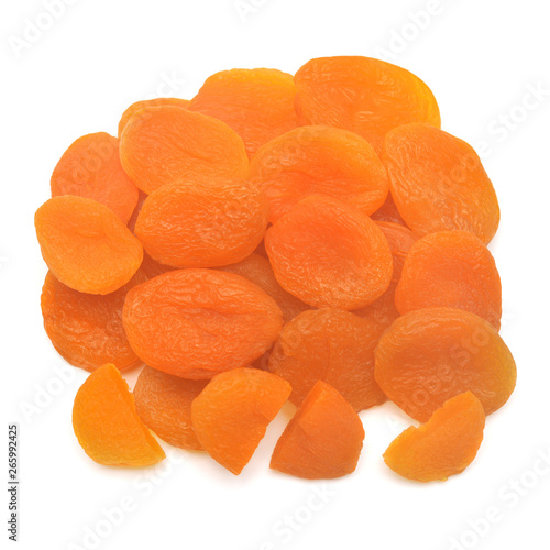 Heap of dried apricots fruit whole and slice isolated on white background. Top view, flat lay