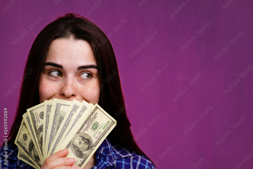 Save money or investment financial for future concept. Rich woman with dollars in hands. Money management and finances. Save money or investment financial for future concept. Rich woman with dollars in hands. Money management and finances.