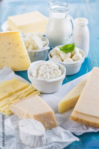 Quadro em tela Different types of dairy products on wooden background