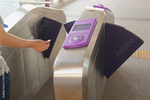 Passenger use coin ticket touch with the automatic access barrier