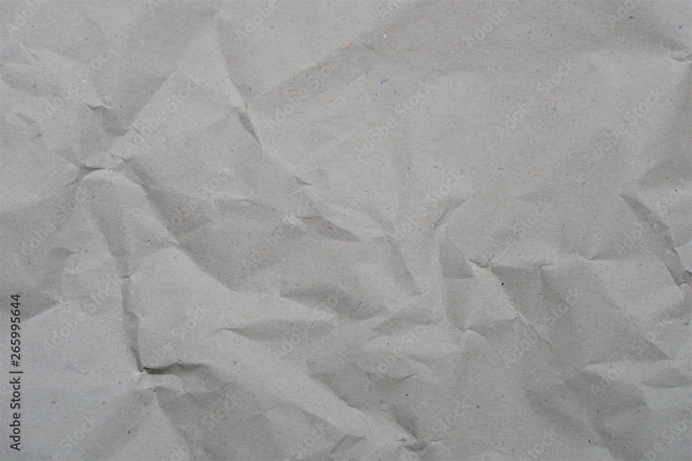 Naklejka premium grey crumpled paper texture for background