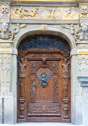 14th century Artus Court on Long Market street, decorative door, Gdansk, Poland.
