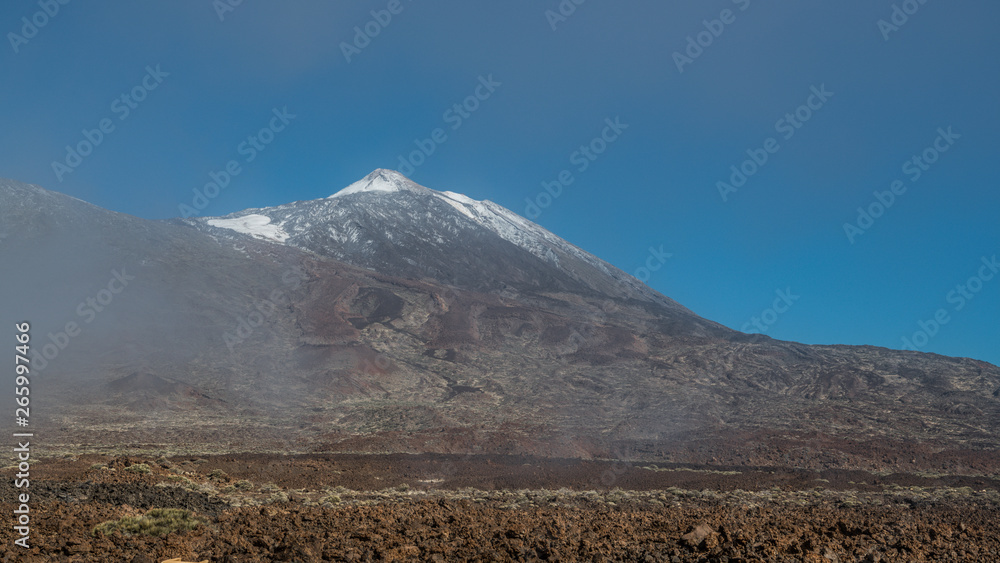 Wisps of fog at the foot of Teide volcano