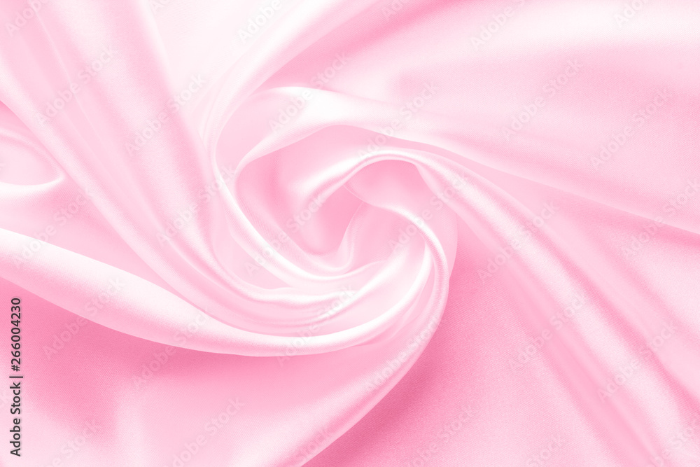 light pink satin fabric with large folds, delicate background light pink satin fabric with large folds, delicate background