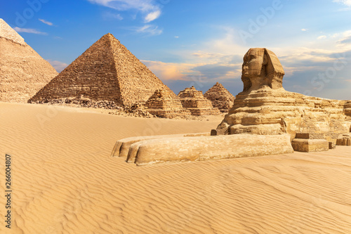 The Sphinx of Giza next to the Pyramids in the desert, Egypt
