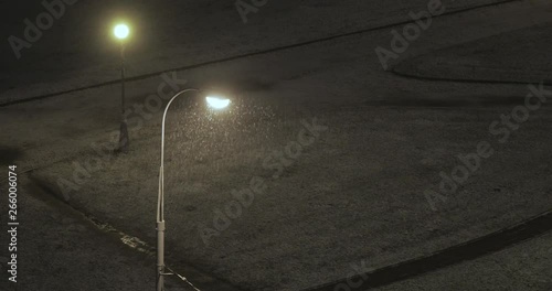 Lantern and sleet at night photo