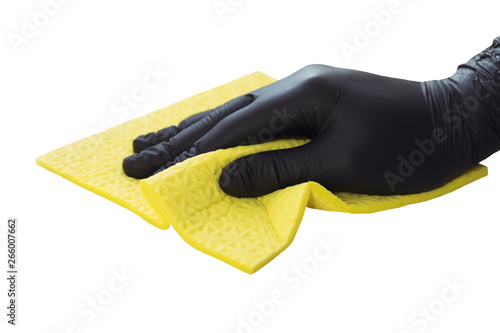 The man in black gloves cleans up in the kitchen, he wipes the table with a rag. Isolated image on white background. photo