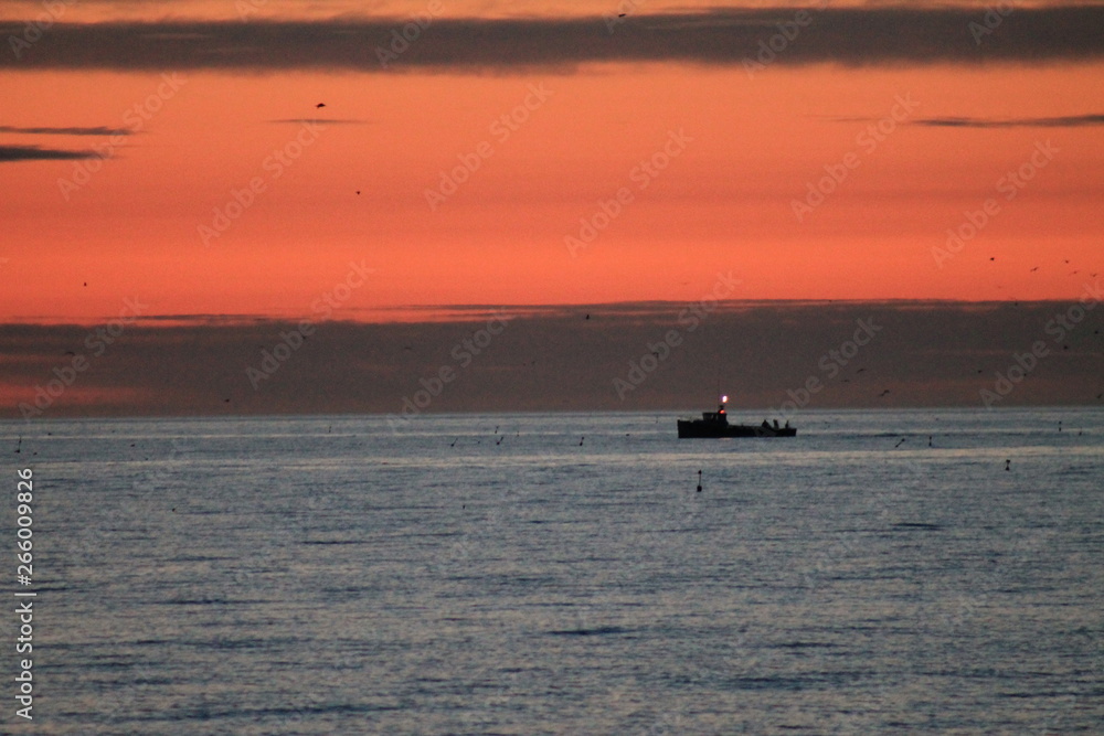 fishing boat at sunset fishing boat at sunset
