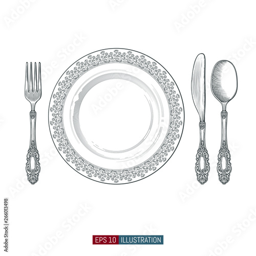 Hand drawn plate, spoon, forks and knifes. Engraved style vector illustration. Elements for your design works.
