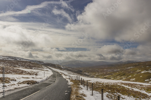 Dramatic winding road and rolling hills - Landscape scenery from Buttertubs Pass, Yorkshire Dales