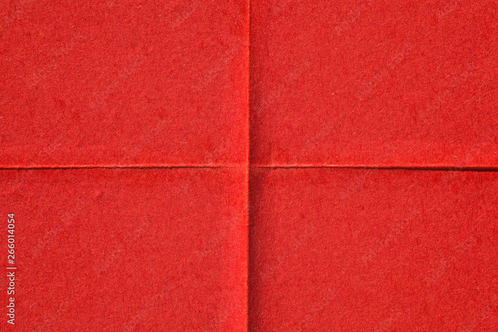 Fototapeta premium Red creased poster texture. Abstract background.